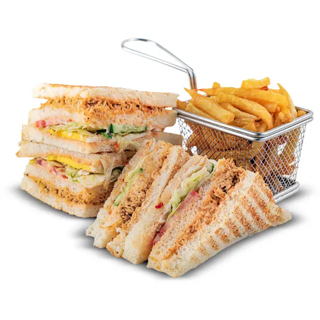 Multi-layered club sandwich with fries at Karachi Fried House